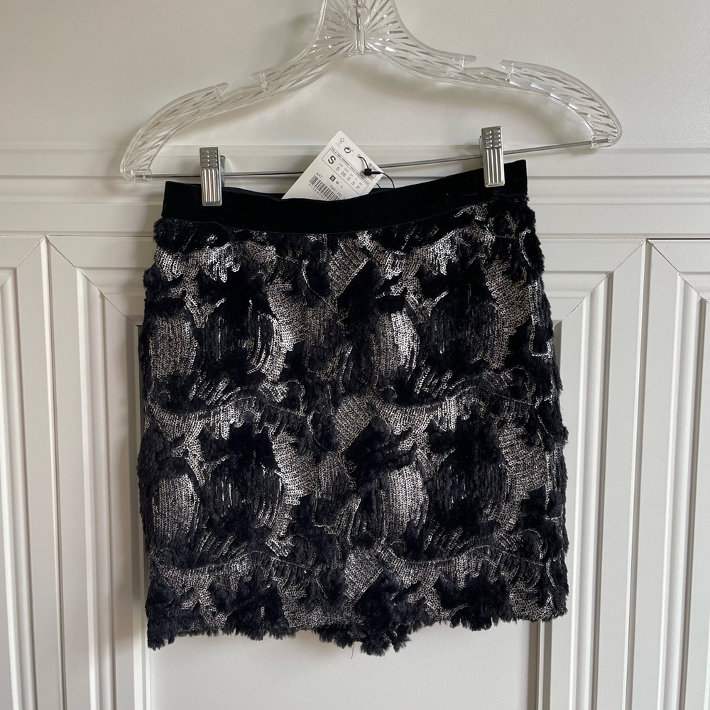 Sequins on a black skirt